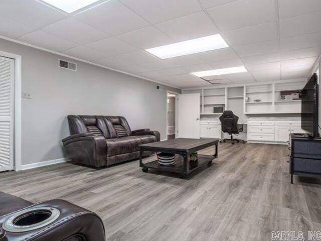 22 Nob Hill Cv, Little Rock, AR 72205 - living area with wood finished floors and an office area
