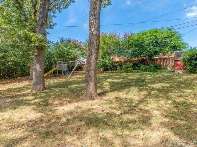 22 Nob Hill Cv, Little Rock, AR 72205 - view of yard with a playground