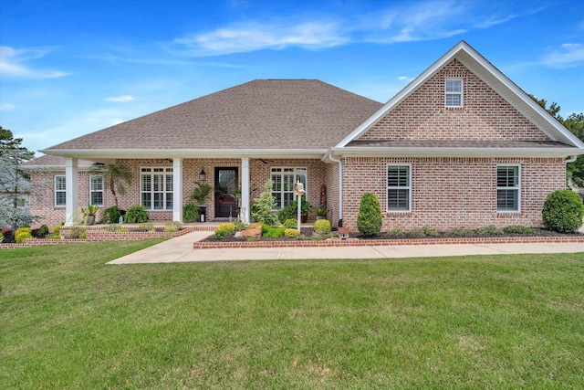 4260 Weldon Cv, Jonesboro, AR 72404 - rear view of property with brick siding, a lawn, a shingled roof, and covered porch