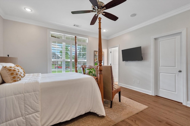 4260 Weldon Cv, Jonesboro, AR 72404 - bedroom featuring wood finished floors, crown molding, recessed lighting, and ceiling fan