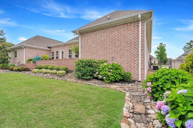 4260 Weldon Cv, Jonesboro, AR 72404 - view of home's exterior featuring brick siding and a shingled roof