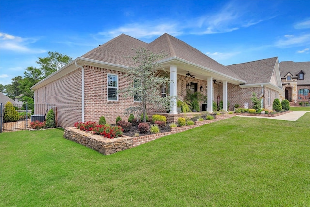 4260 Weldon Cv, Jonesboro, AR 72404 - view of front of house featuring brick siding, ceiling fan, and a shingled roof