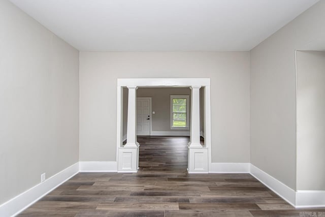 2708 Rock St, Little Rock, AR 72206 - spare room featuring wood finished floors and decorative columns