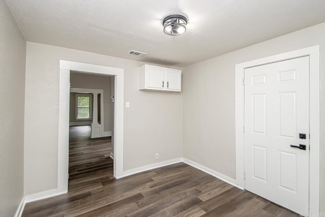 2708 Rock St, Little Rock, AR 72206 - unfurnished room with dark wood finished floors and baseboards