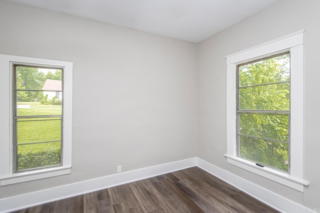 2708 Rock St, Little Rock, AR 72206 - unfurnished room featuring plenty of natural light and dark wood-style floors