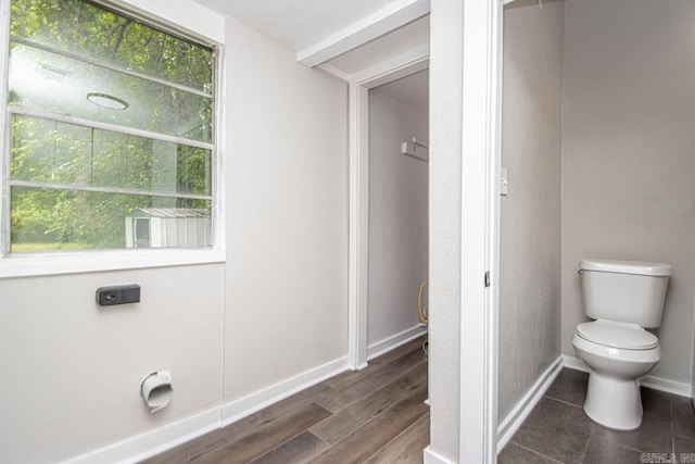 2708 Rock St, Little Rock, AR 72206 - bathroom featuring toilet and wood finished floors