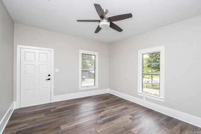 2708 Rock St, Little Rock, AR 72206 - spare room featuring dark wood-type flooring and ceiling fan