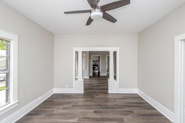 2708 Rock St, Little Rock, AR 72206 - spare room featuring decorative columns, ceiling fan, and wood finished floors
