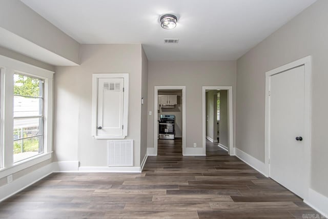 2708 Rock St, Little Rock, AR 72206 - unfurnished room featuring baseboards and wood finished floors