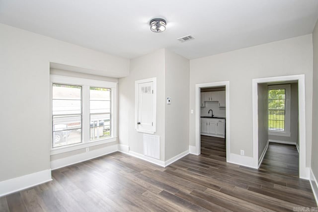 2708 Rock St, Little Rock, AR 72206 - empty room featuring dark wood-style floors