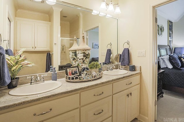 29 Taylor Park Loop, Little Rock, AR 72211 - ensuite bathroom featuring double vanity, crown molding, and a shower with shower door