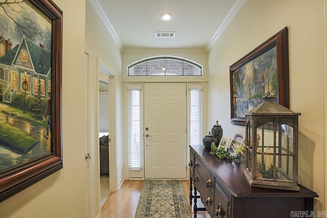 29 Taylor Park Loop, Little Rock, AR 72211 - foyer with crown molding and wood finished floors