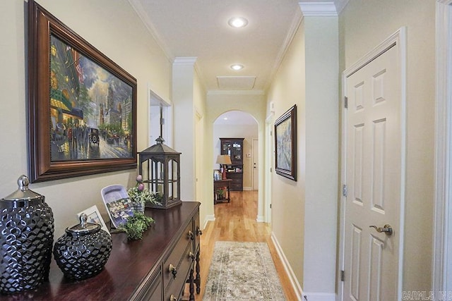 29 Taylor Park Loop, Little Rock, AR 72211 - corridor featuring crown molding, arched walkways, light wood-style flooring, and recessed lighting