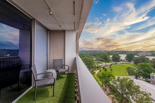 700 E 9th J St Unit 12J, Little Rock, AR 72202 - view of balcony at dusk