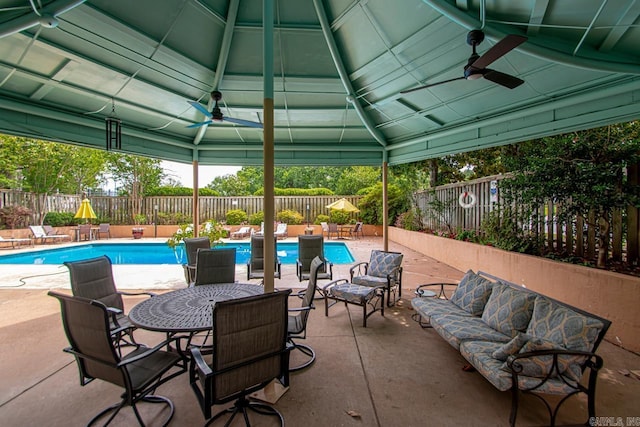 700 E 9th J St Unit 12J, Little Rock, AR 72202 - view of pool with ceiling fan, a fenced backyard, an outdoor living space, and a patio