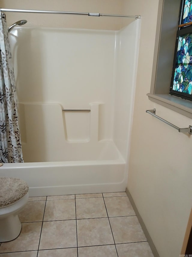 320 S Lewis St, Mineral Sprs, AR 71851 - bathroom with shower / tub combo with curtain and tile patterned floors
