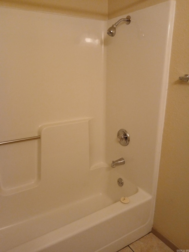 320 S Lewis St, Mineral Sprs, AR 71851 - bathroom featuring tile patterned floors and shower / bath combination