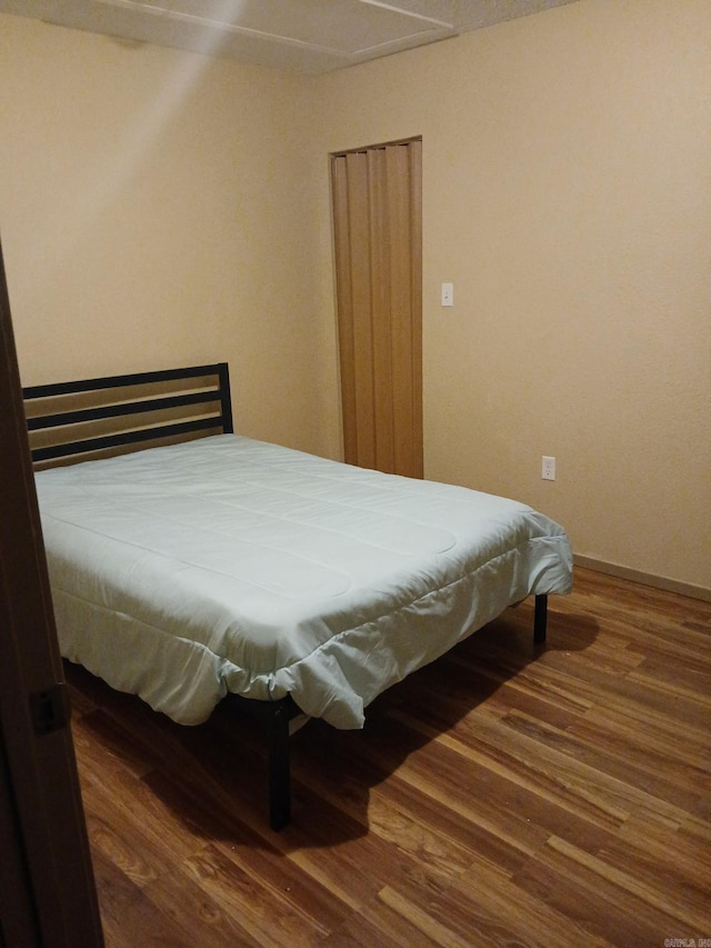 320 S Lewis St, Mineral Sprs, AR 71851 - bedroom featuring wood finished floors