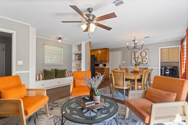 1920 W Arch Ave, Searcy, AR 72143 - living room featuring wood finished floors, ornamental molding, ceiling fan, a chandelier, and wainscoting