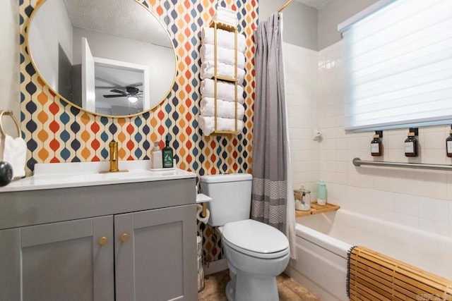 1920 W Arch Ave, Searcy, AR 72143 - full bath with ceiling fan, wallpapered walls, vanity, and shower / bath combination with curtain