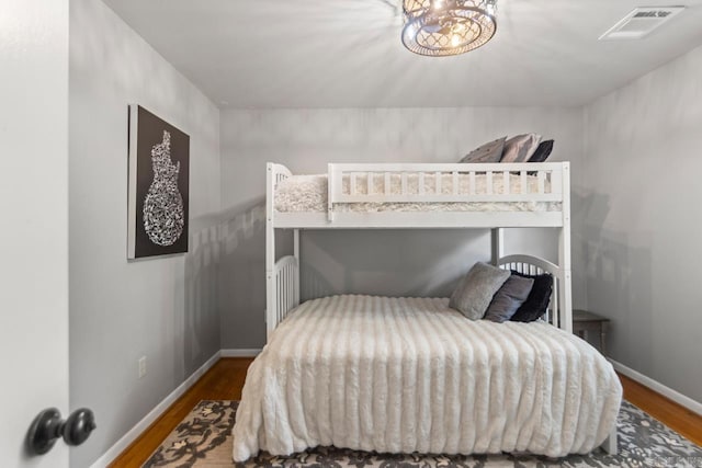 1920 W Arch Ave, Searcy, AR 72143 - bedroom featuring wood finished floors and baseboards