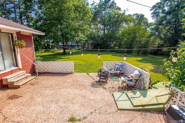 1920 W Arch Ave, Searcy, AR 72143 - view of green lawn with a patio and a fire pit