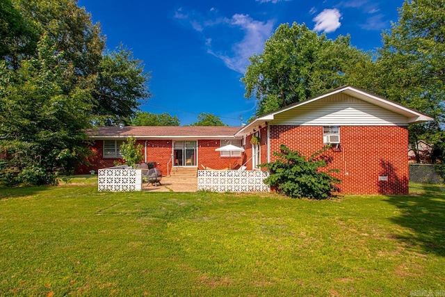 1920 W Arch Ave, Searcy, AR 72143 - rear view of property with brick siding, a patio area, a yard, and crawl space