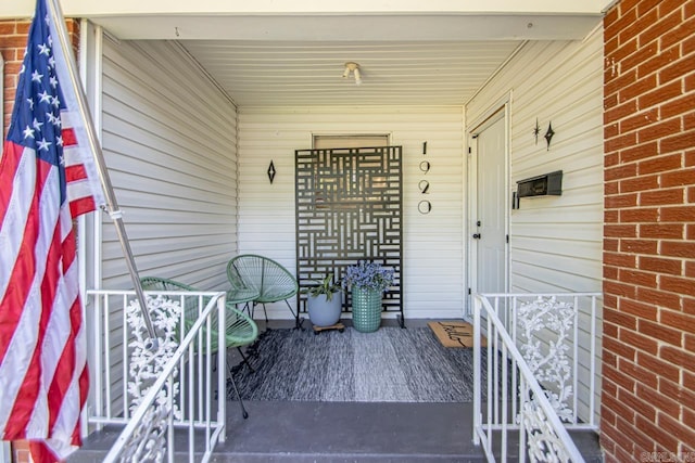 1920 W Arch Ave, Searcy, AR 72143 - property entrance featuring a porch and brick siding