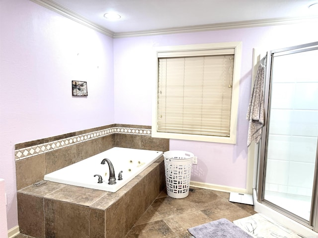 full bathroom featuring a jetted tub, ornamental molding, and a shower stall