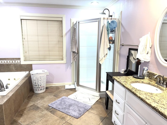 bathroom featuring crown molding, a jetted tub, a stall shower, and vanity