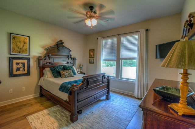 152 Callaway Cir, Hot Springs, AR 71913 - bedroom featuring wood finished floors and a ceiling fan