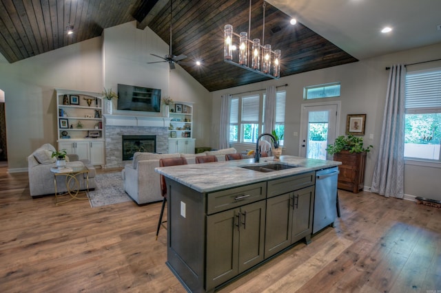 152 Callaway Cir, Hot Springs, AR 71913 - kitchen with dishwasher, high vaulted ceiling, gray cabinets, a center island with sink, and decorative light fixtures