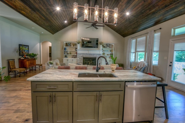 152 Callaway Cir, Hot Springs, AR 71913 - kitchen featuring stainless steel dishwasher, wood ceiling, a stone fireplace, open floor plan, and arched walkways