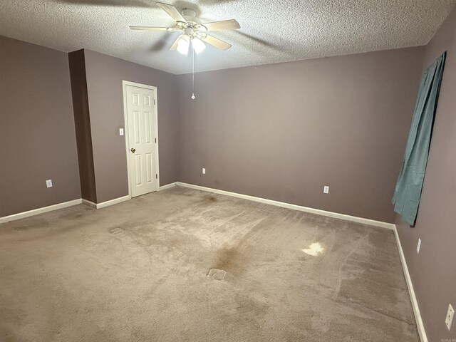 1008 Fox Ridge Dr, Benton, AR 72019 - carpeted empty room featuring a textured ceiling and ceiling fan