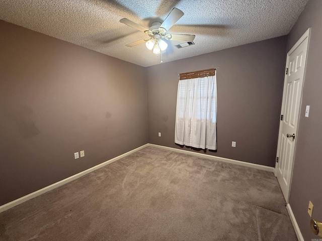 1008 Fox Ridge Dr, Benton, AR 72019 - carpeted spare room featuring ceiling fan and a textured ceiling