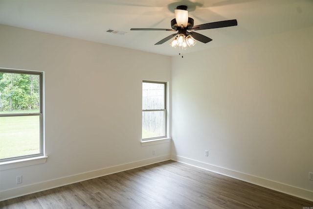 4013 Springwood Cir, Bryant, AR 72022 - spare room with plenty of natural light, ceiling fan, and wood finished floors
