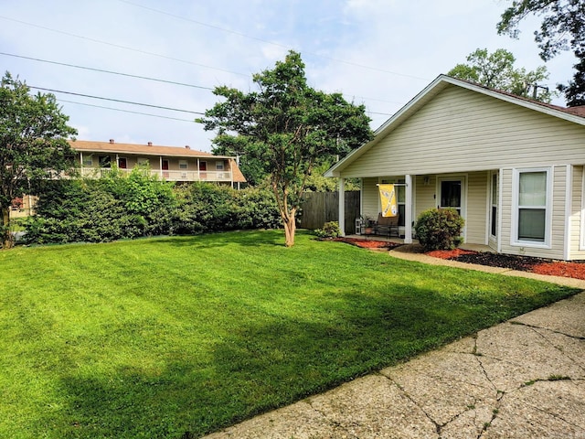 view of yard with covered porch