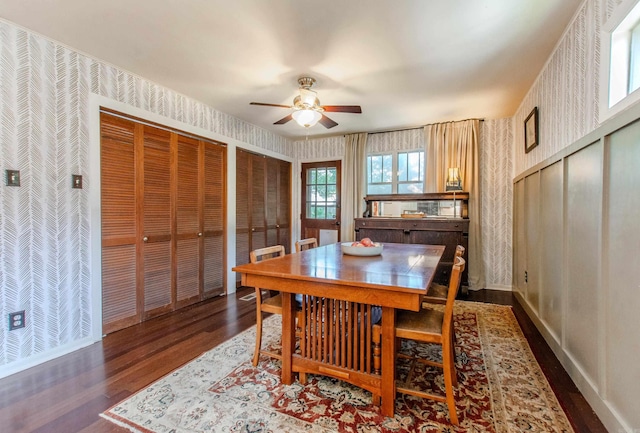 319 W G Ave, North Little Rock, AR 72116 - dining room featuring wallpapered walls, a ceiling fan, and wood finished floors