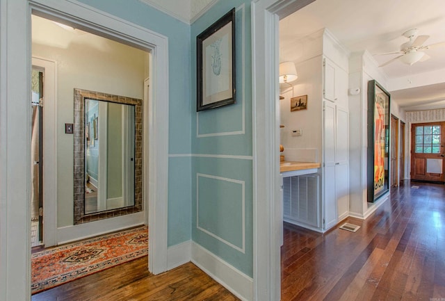 319 W G Ave, North Little Rock, AR 72116 - hall with dark wood finished floors and ornamental molding