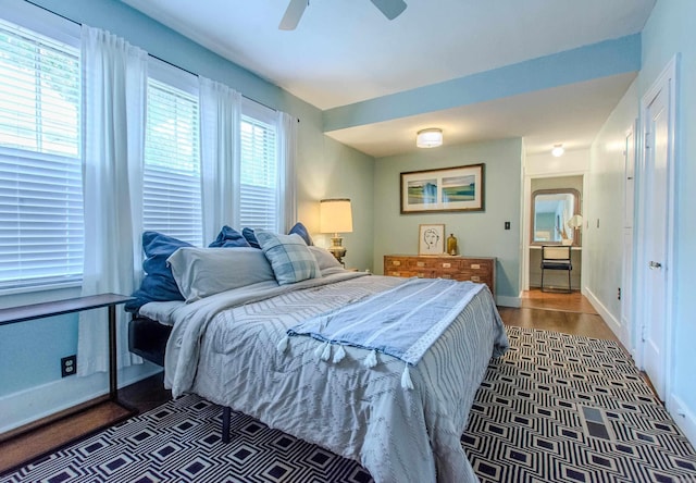 319 W G Ave, North Little Rock, AR 72116 - bedroom with baseboards and a ceiling fan