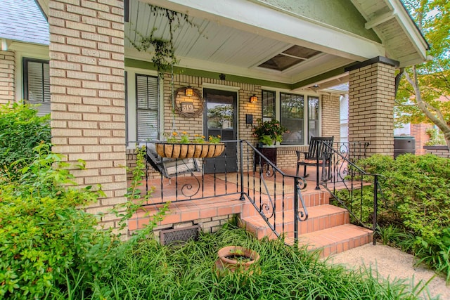 319 W G Ave, North Little Rock, AR 72116 - entrance to property featuring a porch and brick siding
