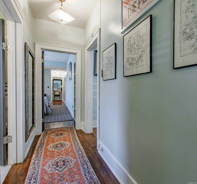 319 W G Ave, North Little Rock, AR 72116 - hall featuring dark wood-style floors