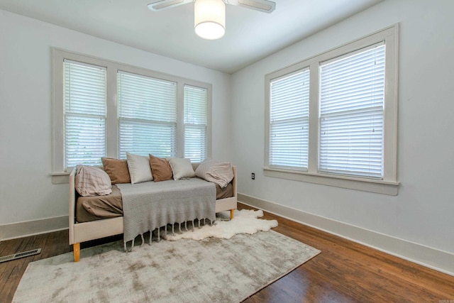 319 W G Ave, North Little Rock, AR 72116 - bedroom with dark wood finished floors and ceiling fan