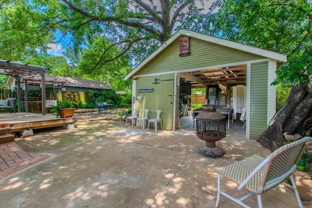 319 W G Ave, North Little Rock, AR 72116 - view of patio / terrace featuring a pergola and an outdoor structure