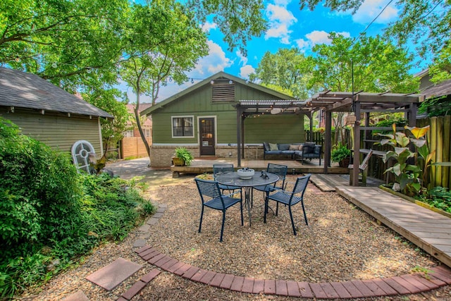 319 W G Ave, North Little Rock, AR 72116 - fenced backyard featuring a pergola, an outdoor living space, and a patio