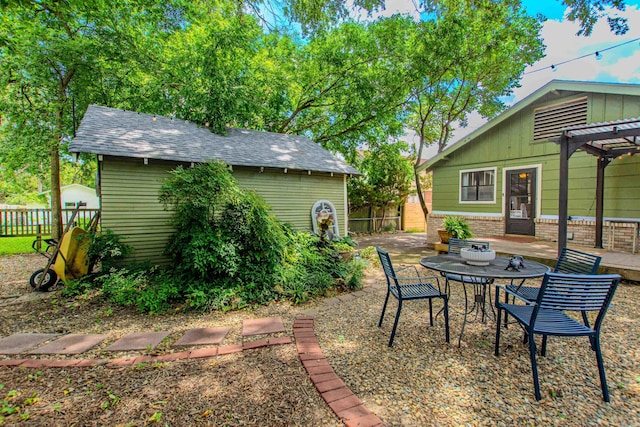 319 W G Ave, North Little Rock, AR 72116 - view of yard featuring a pergola and a patio