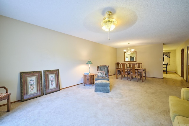 109 Indian Hills St Unit C-5, Hot Springs, AR 71913 - living area featuring a ceiling fan, carpet, and a chandelier