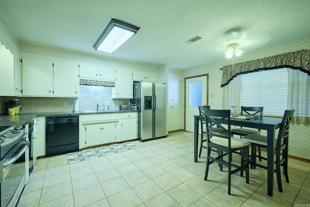 109 Indian Hills St Unit C-5, Hot Springs, AR 71913 - kitchen featuring stainless steel appliances, wallpapered walls, a ceiling fan, backsplash, and a textured ceiling