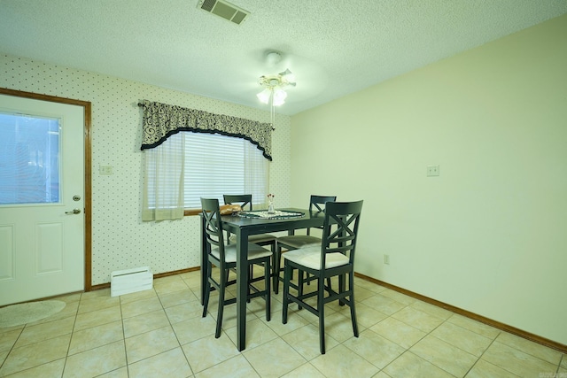 109 Indian Hills St Unit C-5, Hot Springs, AR 71913 - dining area featuring a textured ceiling, wallpapered walls, and light tile patterned flooring
