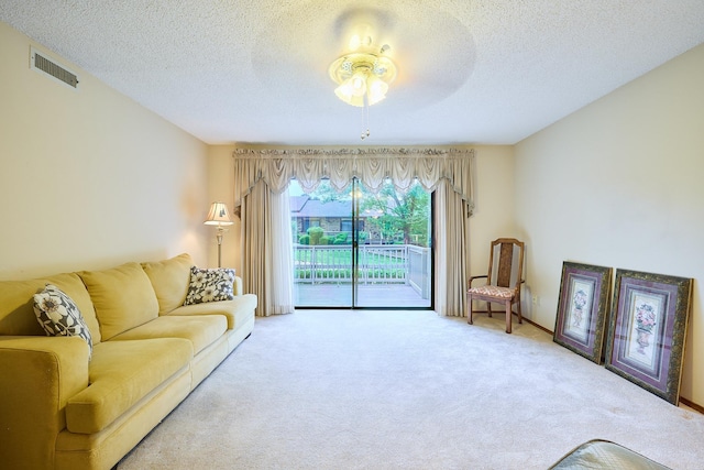 109 Indian Hills St Unit C-5, Hot Springs, AR 71913 - carpeted living area featuring a ceiling fan and a textured ceiling